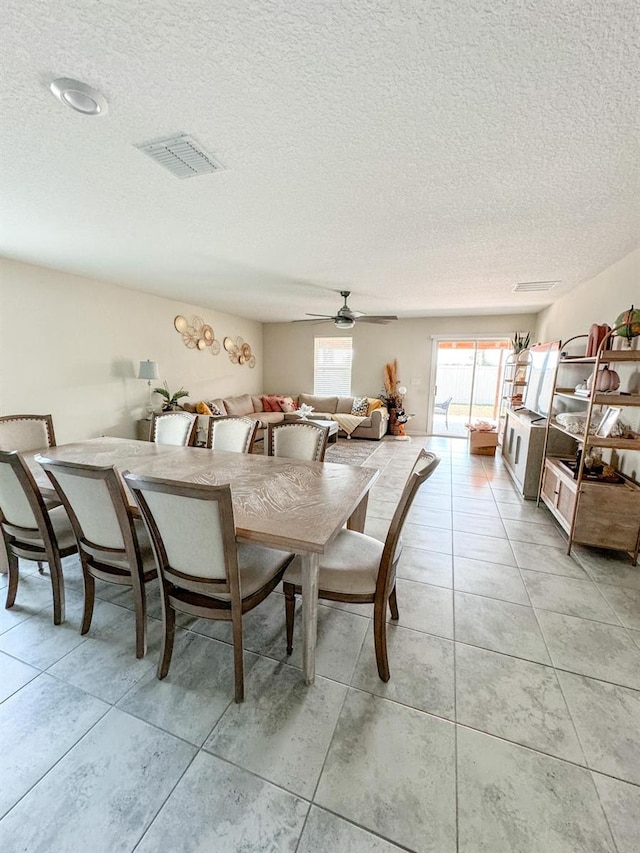 dining area featuring ceiling fan