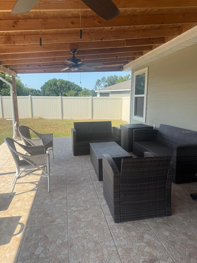 view of patio / terrace featuring an outdoor living space and ceiling fan