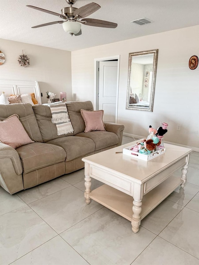 living room with ceiling fan