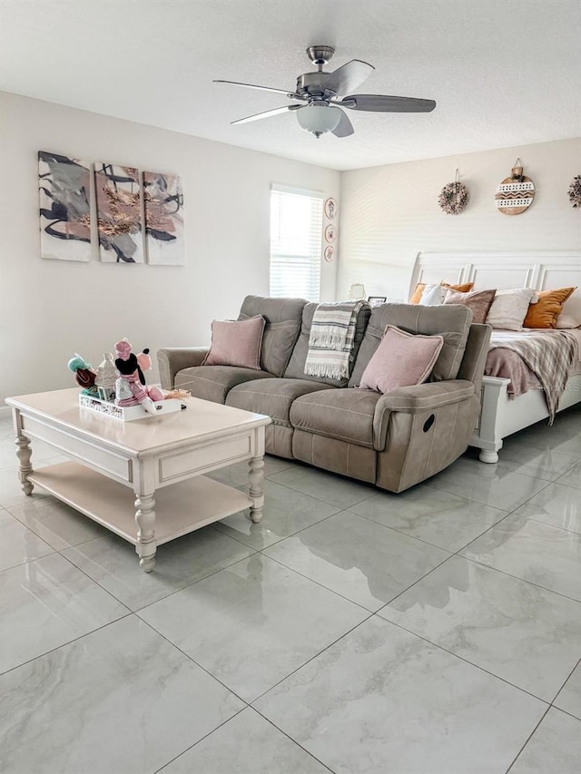 living room with ceiling fan