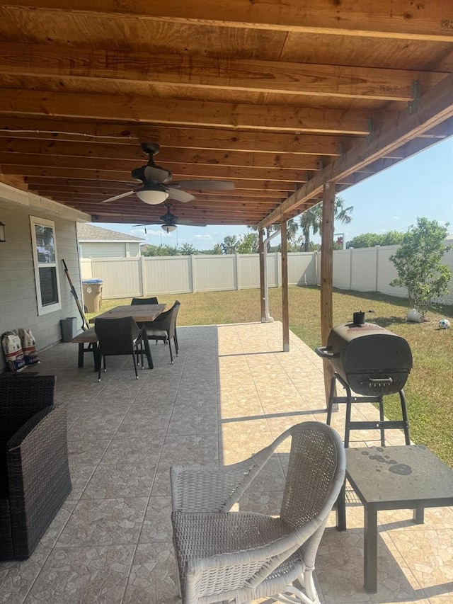 view of patio / terrace featuring ceiling fan