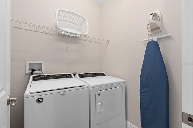 laundry area featuring washer hookup and washing machine and clothes dryer