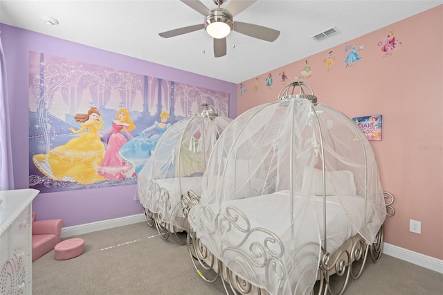 carpeted bedroom with ceiling fan