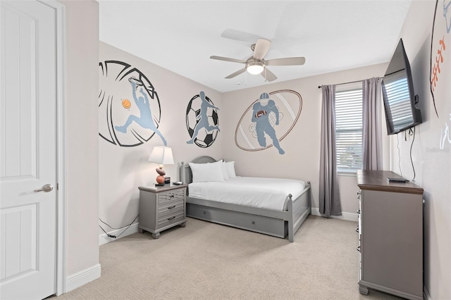 bedroom with light colored carpet and ceiling fan