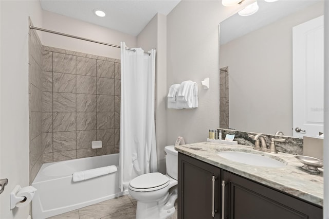 full bathroom featuring shower / bath combo, tile floors, toilet, and vanity