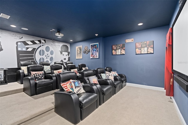 home theater room featuring light carpet