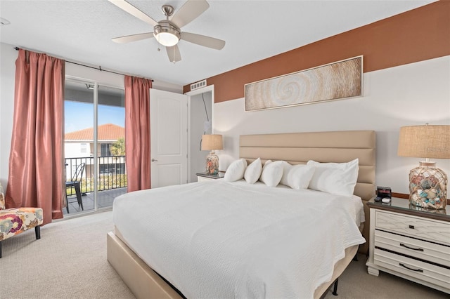 carpeted bedroom featuring ceiling fan and access to exterior