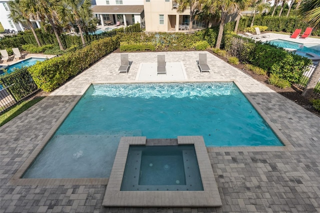 view of pool featuring a patio