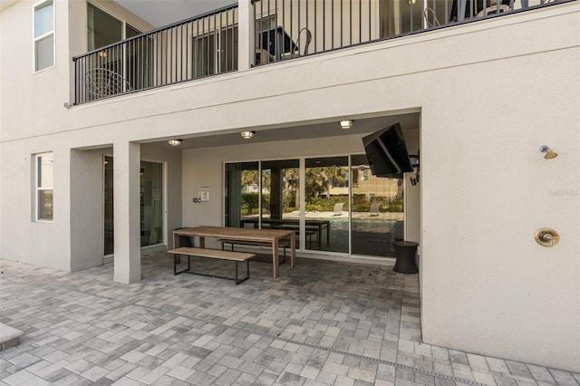 view of patio with a balcony