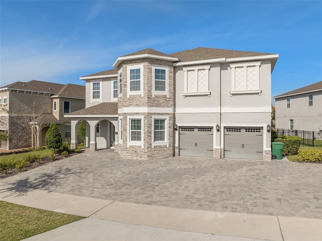 view of front of home with a garage