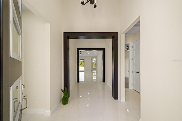 hallway featuring light tile patterned flooring