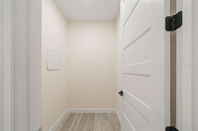 washroom with light wood-type flooring