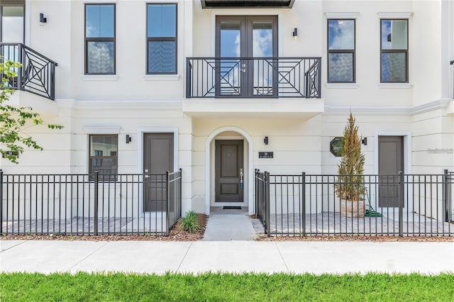 view of front of home with a balcony