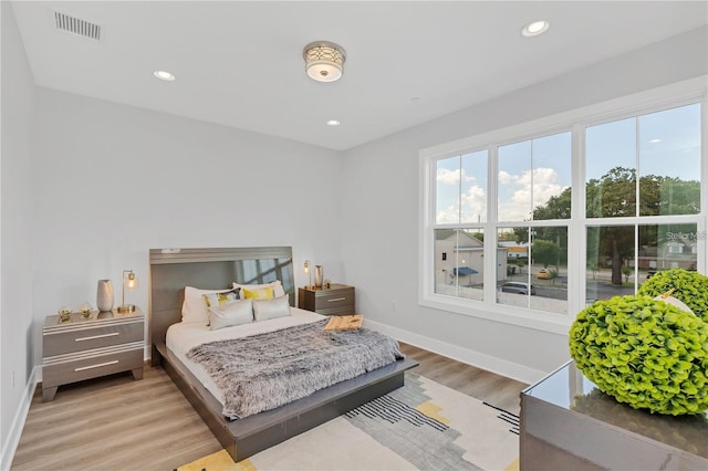 bedroom featuring light wood-type flooring