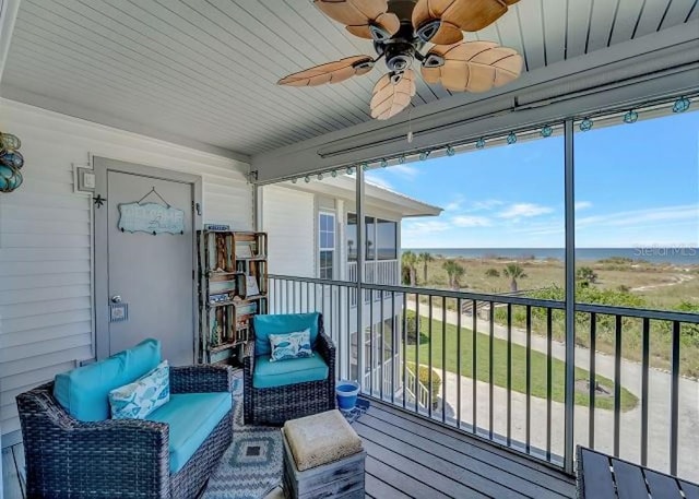 exterior space with ceiling fan