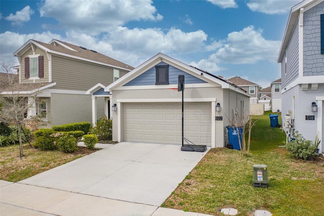 view of front of house with a front lawn and a garage