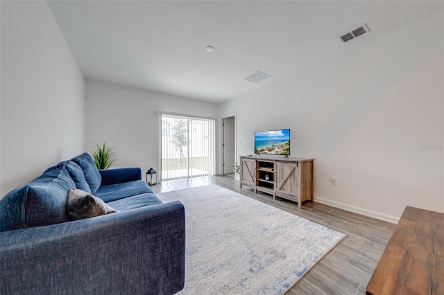 living room featuring light wood-type flooring