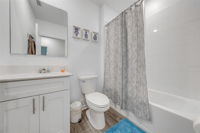 full bathroom with toilet, shower / bath combo, and vanity