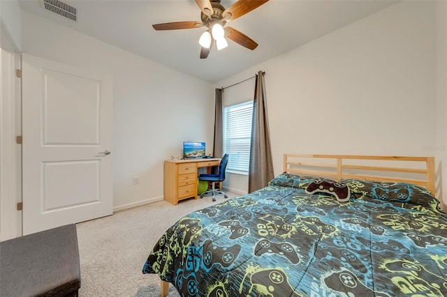 bedroom featuring ceiling fan and light colored carpet