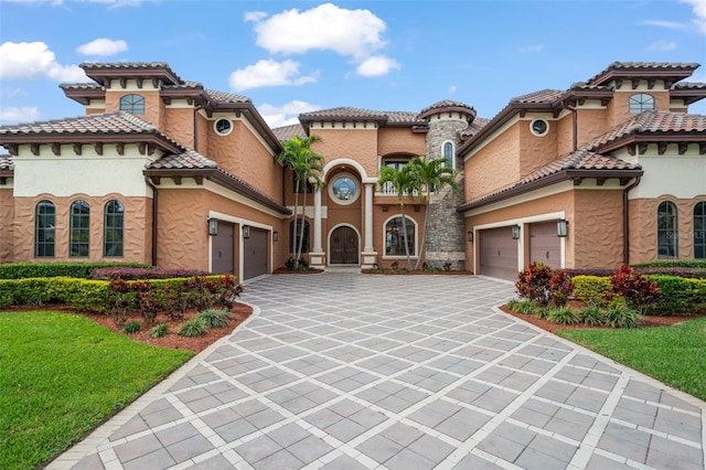 mediterranean / spanish home featuring a garage