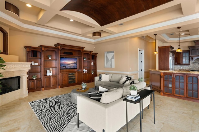 tiled living room with coffered ceiling, ornamental molding, a high ceiling, and a premium fireplace