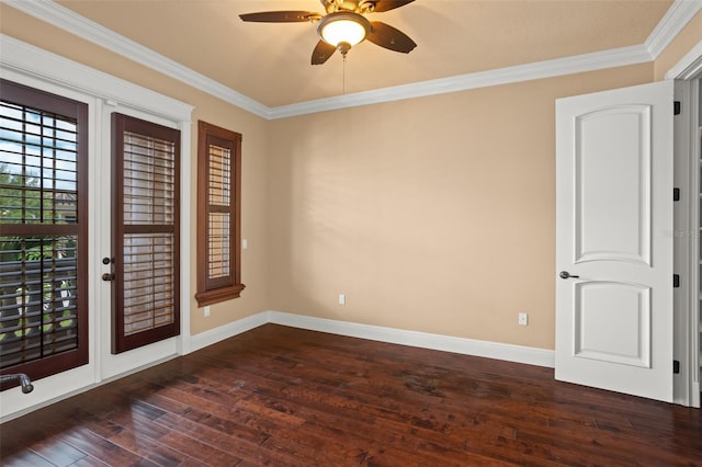 empty room featuring crown molding, ceiling fan, and dark hardwood / wood-style flooring