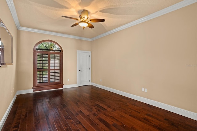 spare room with crown molding, dark hardwood / wood-style floors, and ceiling fan