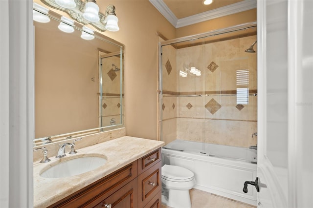 full bathroom featuring toilet, ornamental molding, tile flooring, combined bath / shower with glass door, and vanity