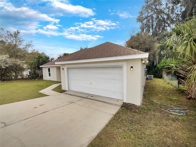 garage with a lawn