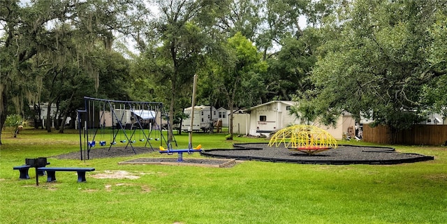 view of playground with a lawn