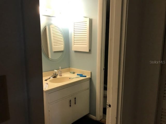 bathroom featuring large vanity