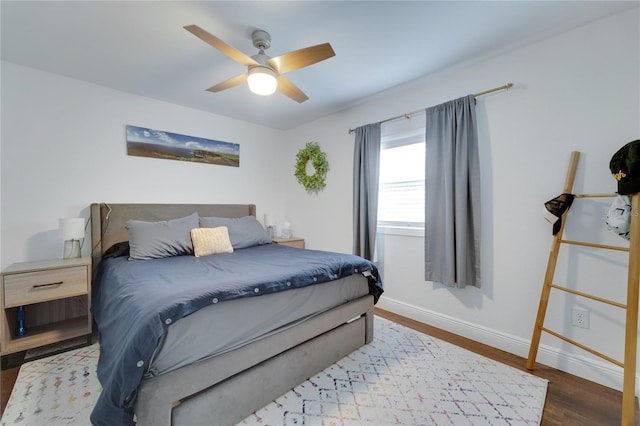 bedroom featuring ceiling fan and wood-type flooring