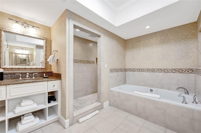 bathroom with vanity, ornamental molding, separate shower and tub, and tile patterned flooring