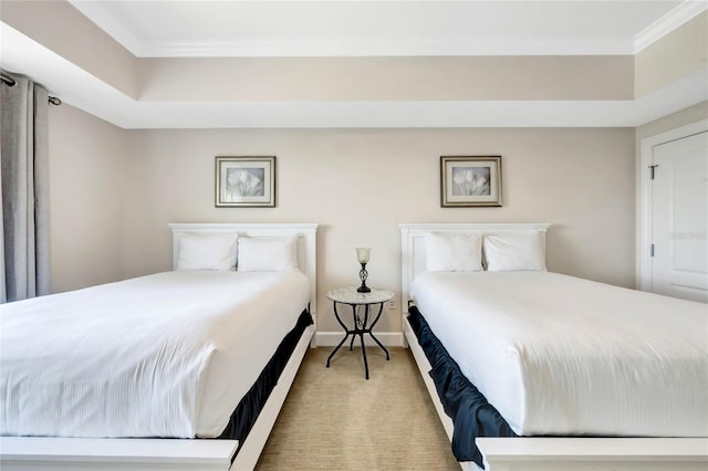 bedroom with carpet floors and ornamental molding