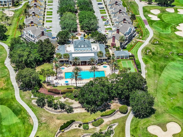 birds eye view of property with view of golf course
