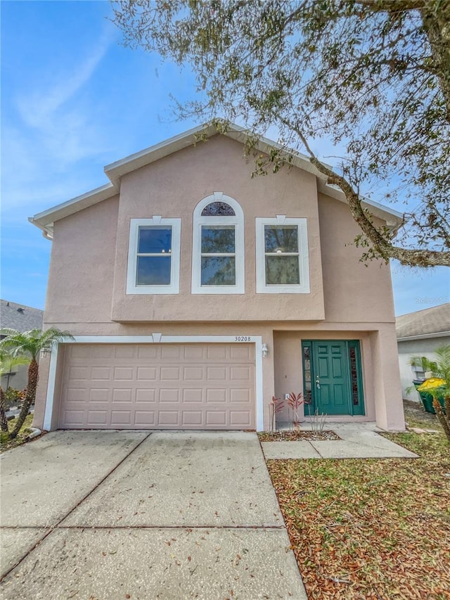 view of front property with a garage