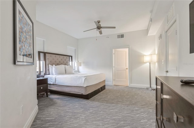 bedroom with dark carpet and ceiling fan