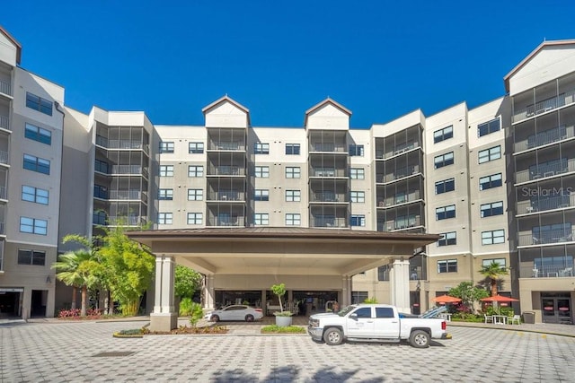 view of building exterior featuring a carport