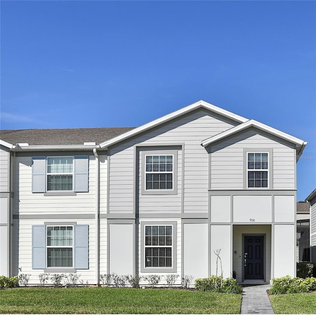 view of front of home with a front yard