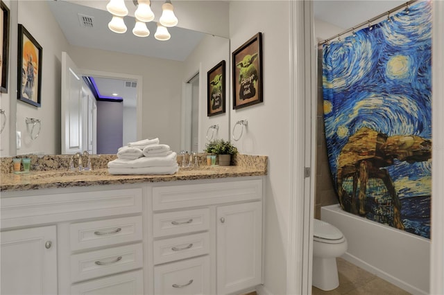 full bathroom with tile floors, toilet, vanity, and shower / bath combo with shower curtain