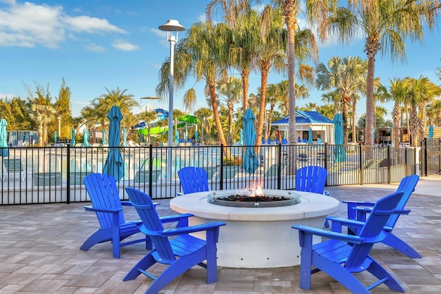 view of patio featuring an outdoor fire pit