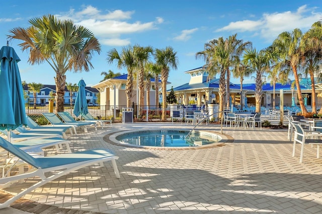 view of swimming pool with a patio