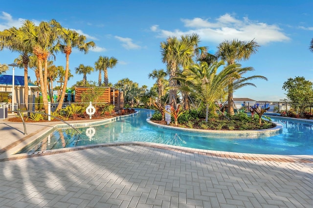 view of pool featuring a patio