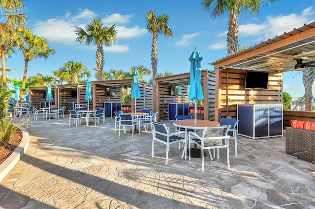 view of patio / terrace featuring ceiling fan