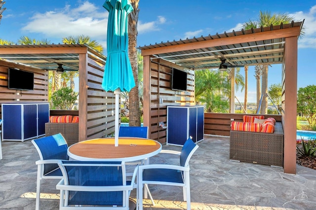 view of patio with an outdoor hangout area, a pergola, and ceiling fan