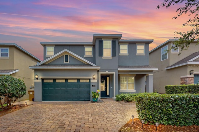 view of front of property featuring a garage