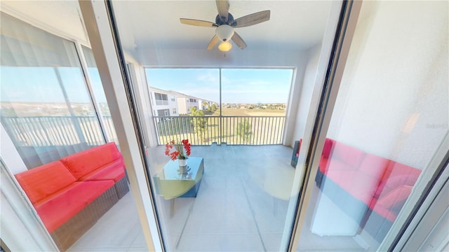 balcony featuring ceiling fan