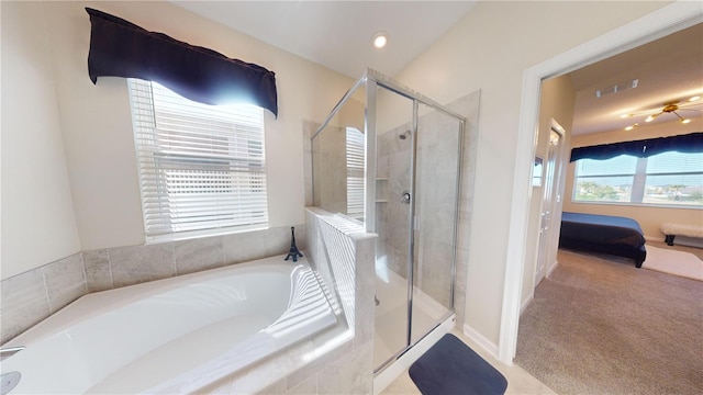 bathroom with separate shower and tub