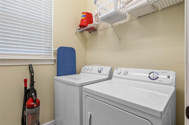 laundry room with independent washer and dryer