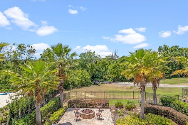 exterior space with a patio area and a lawn